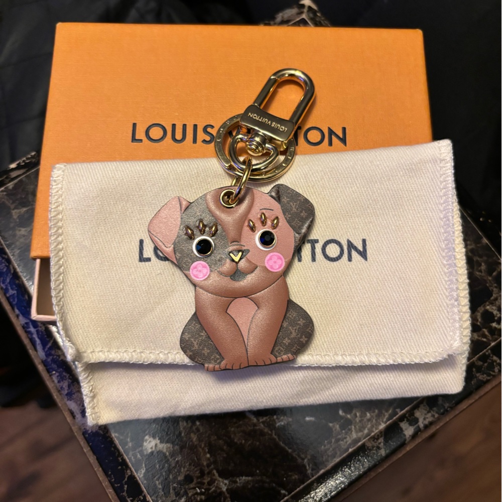 Generally Used Louis Vuitton Bag Or Key Charm No Signs Of Wear